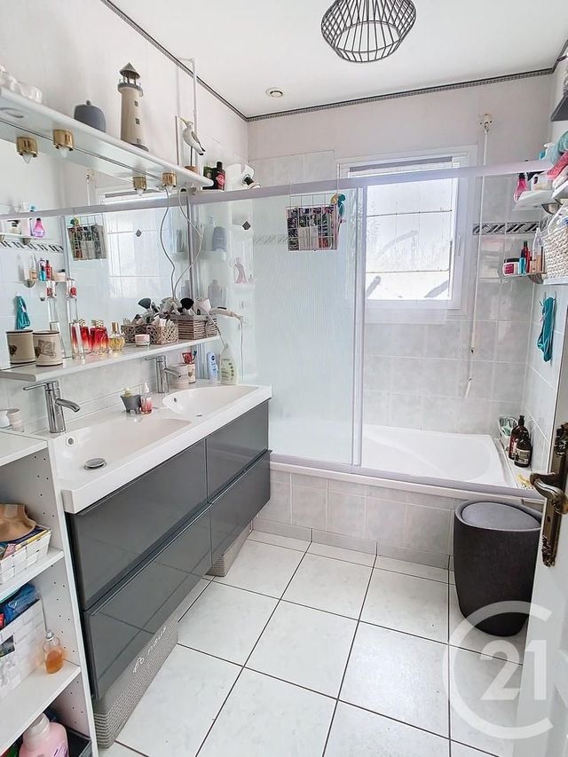 Afficher la photo en grand maison à vendre - 9 pièces - 188.0 m2 - LE TOUR DU PARC - 56 - BRETAGNE - Century 21 Sarz'Eau Immobilier