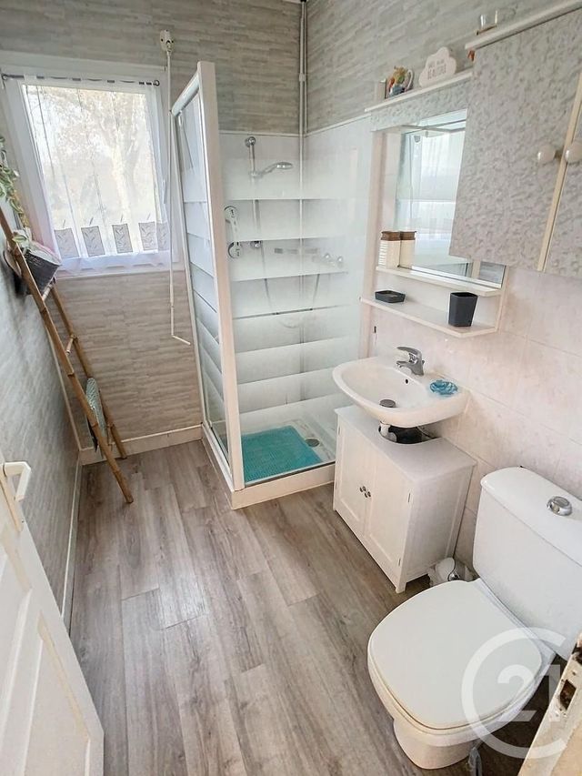 Afficher la photo en grand maison à vendre - 9 pièces - 188.0 m2 - LE TOUR DU PARC - 56 - BRETAGNE - Century 21 Sarz'Eau Immobilier